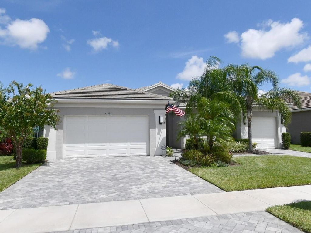 Photo of 11886 SW Sailfish Isles Way, Port Saint Lucie, FL 34987 (MLS # B26008601)