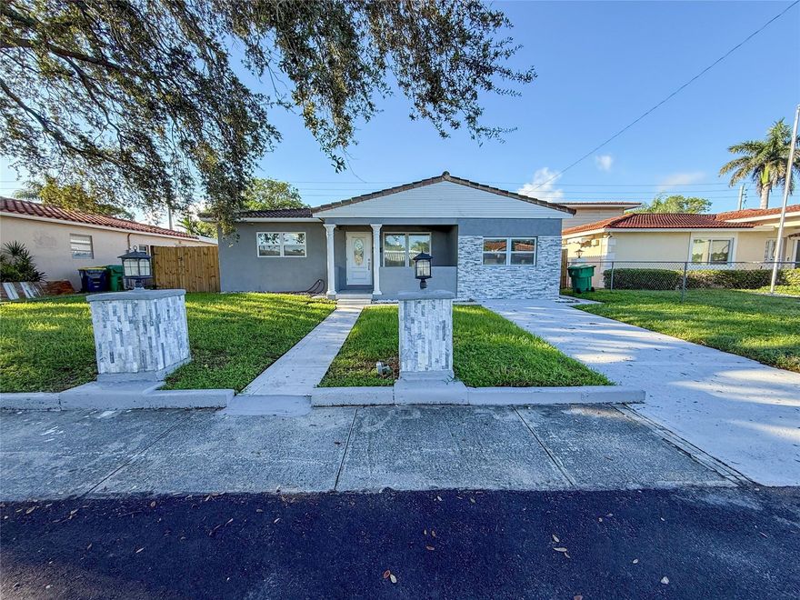 Welcome to this light and bright single-family home offering modern updates and a spacious open floor plan. Newly renovated with tile flooring throughout, this home features impact windows, brand-new appliances, and a versatile bonus room perfect as a third bedroom, home office, or playroom. Step outside to enjoy the large fenced backyard, ideal for entertaining, pets, or simply relaxing in your private outdoor space. The ample driveway and front parking area easily accommodate multiple vehicles. Inside, the open layout creates a seamless flow with plenty of natural light. Additional peace of mind comes with the city’s recent installation of new drain pipes. Conveniently located near beaches, shopping, dining, and major highways.