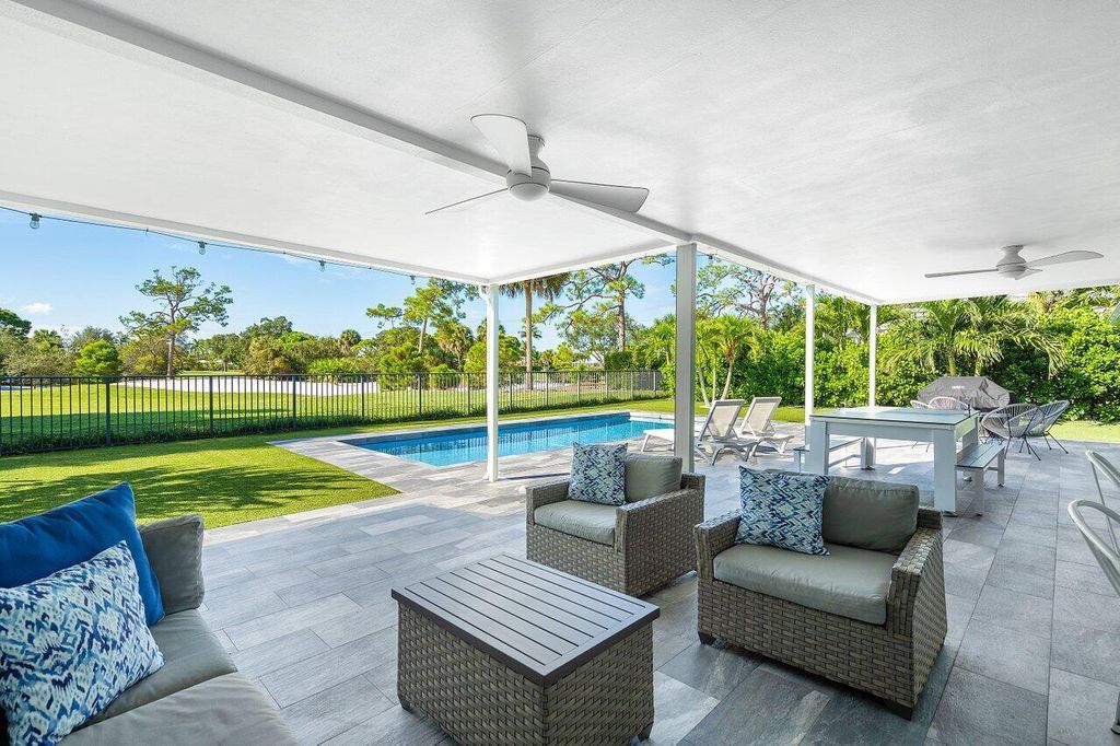 Photo of 329 Fairway N, Tequesta, FL 33469 (MLS # R10924130)