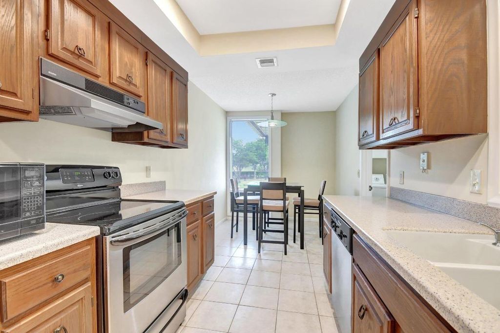 Photo of 19807 Boca West Drive #4042, Boca Raton, FL 33434 (MLS # R11038411)