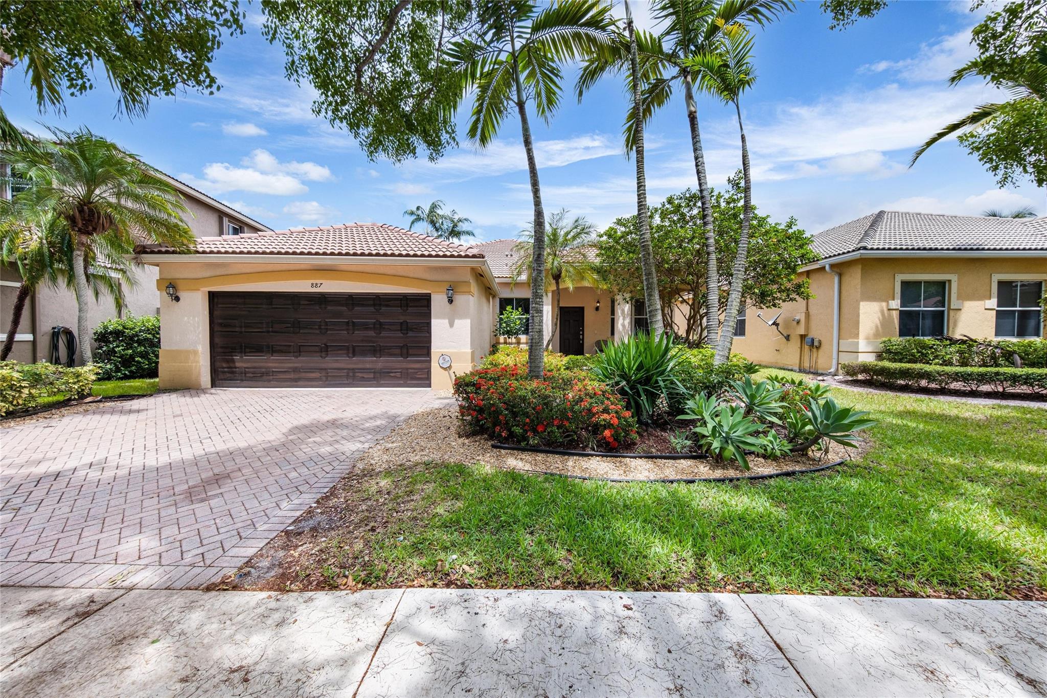 Welcome to 887 Nandina Dr, a beautifully appointed home nestled in the desirable community of Weston, FL. Designed with comfort and modern living in mind, this exceptional four-bedroom, two-bathroom residence invites you to experience a harmonious blend of space, style, and convenience. The ideal choice for growing families or those seeking room to spread out, every detail of this property speaks to quality and ease of living.