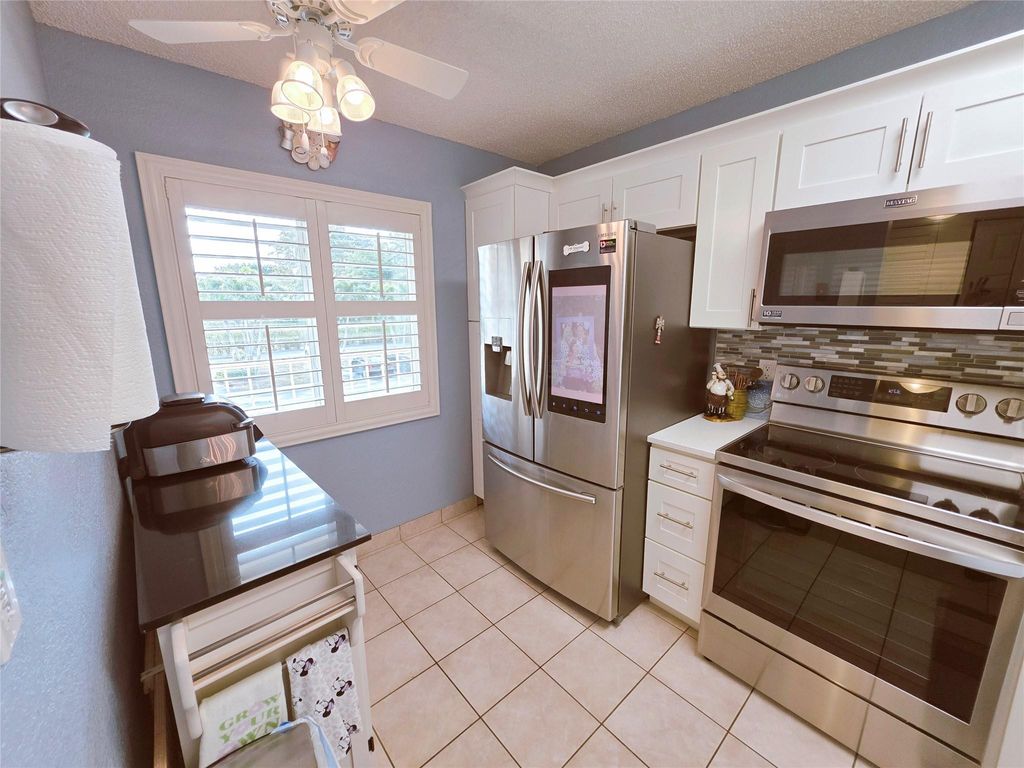 Photo of 7145 Huntington Lane #208, Delray Beach, FL 33446 (MLS # F10551514)