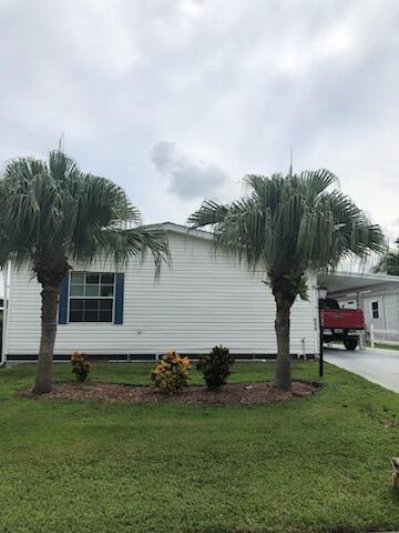 Photo of 8579 Gallberry Circle, Port Saint Lucie, FL 34952 (MLS # B26042706)