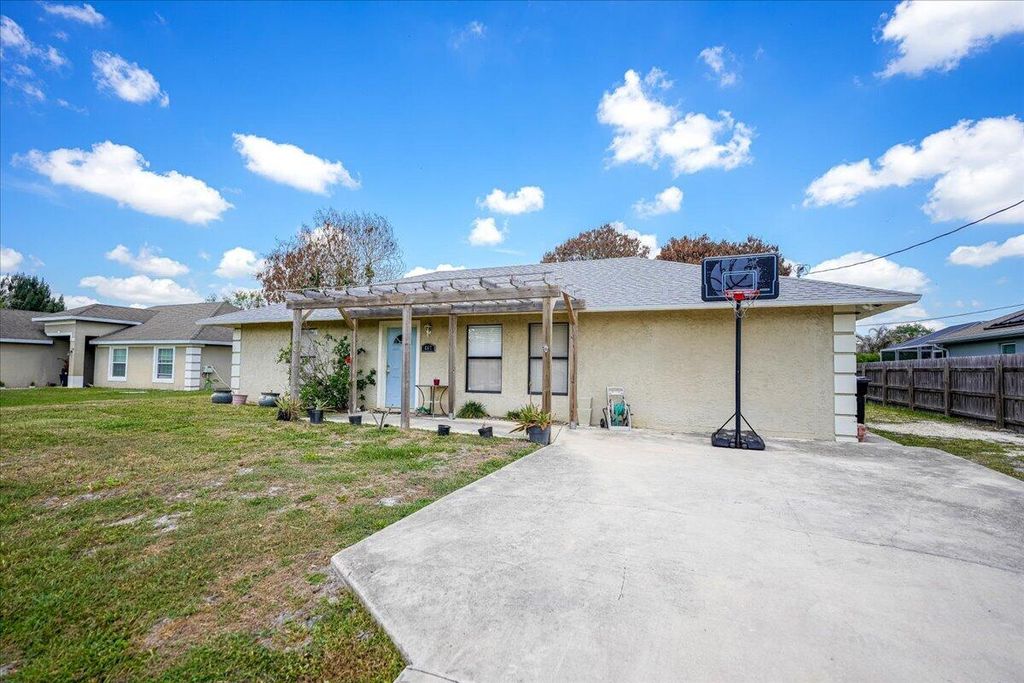 Photo of 667 SE Faith Terrace, Port Saint Lucie, FL 34983 (MLS # B26023941)