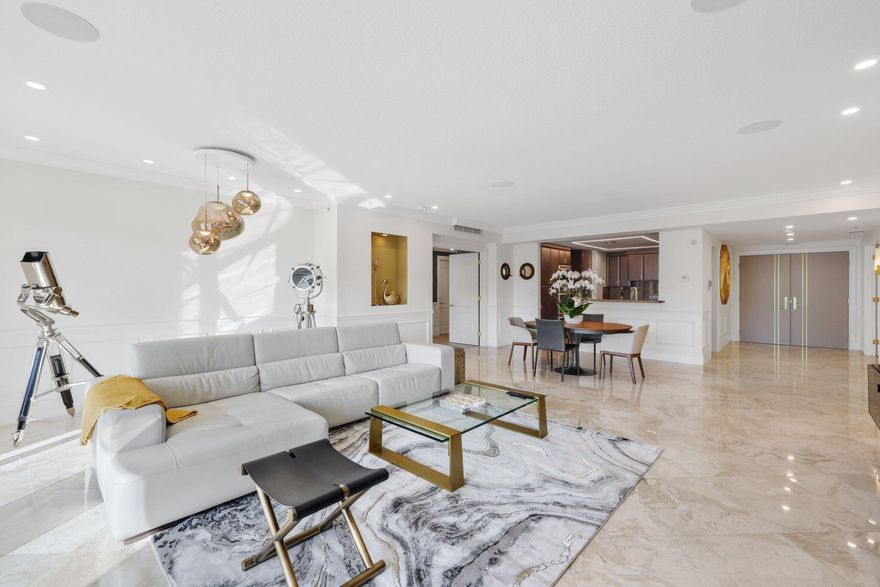 IMPECCABLY DESIGNED LOWER PENTHOUSE - TURNKEY ANNUAL LEASE. Fully appointed 2- bedroom, 2.1 bath + den/home office, features 10' ceilings, custom lighting, bold wallpaper, and designer furnishings...blending sleek Miami luxury with New York City chic. Enjoy an open floor plan, split- en suite bedrooms with oversized custom closets. The expansive balcony allows access from both bedrooms and captures colorful sunsets, perfect for relaxing, reading and evening cocktails. 200 East is a luxury full service building located in the heart of downtown Boca Raton, just steps to Mizner Park and Royal Palm Plaza, entertainment and some of Boca's finest restaurants.