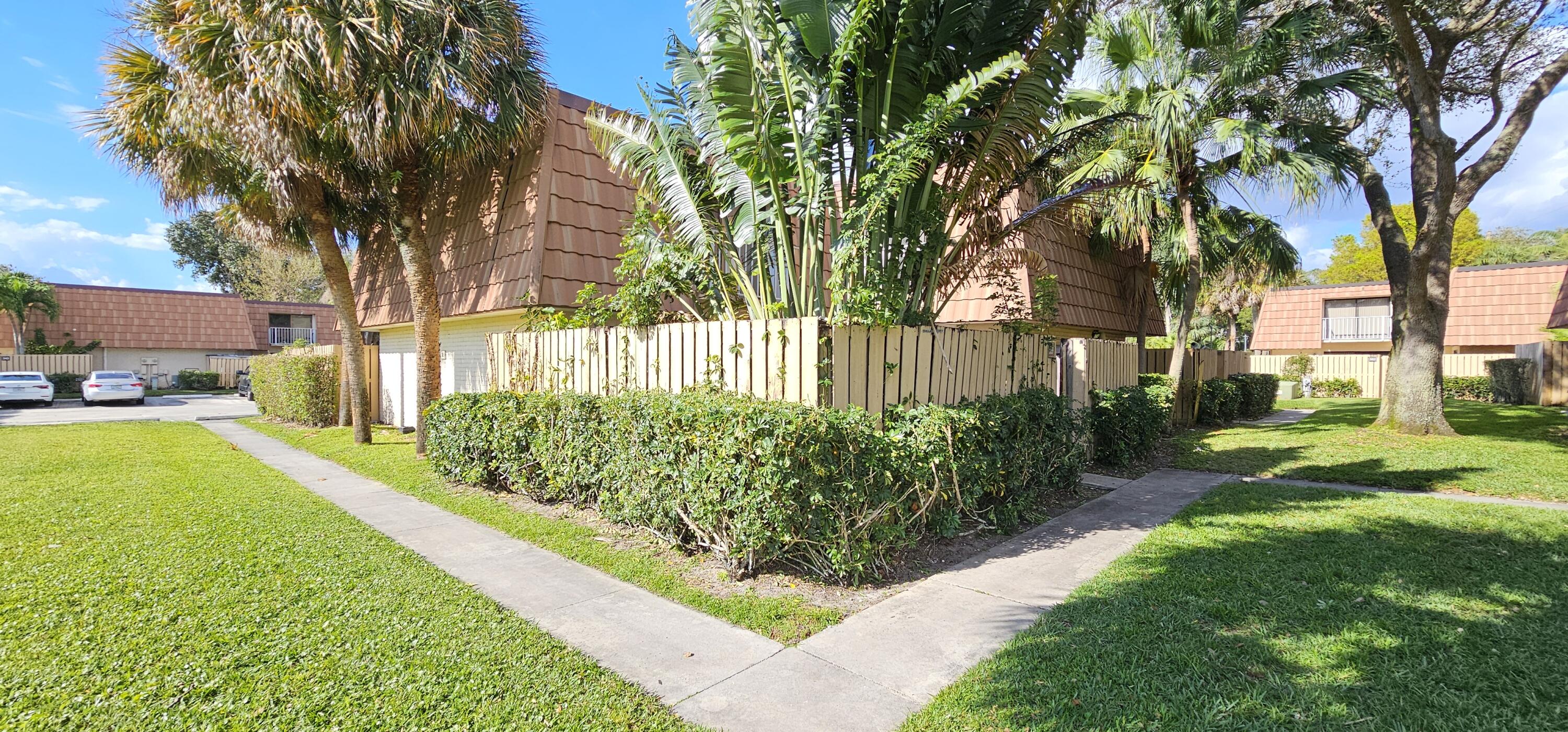 Beautiful, spacious and cozy 2 bedroom, 2 1/2 bath, Townhouse. Enjoy your fenced in shaded patio surrounded by beautiful lakes with breathtaking views! in the heart of West Palm beach. WATER, CABLE, LAWN CARE Included. Very large family room. Master bedroom has walk in closet, bathroom with dual sinks and glass shower. Both bedrooms have balconies. Full size washer and dryer in the property. Private fenced court yard. Convenient location. Close to school, Palm Beach Outlet Mall, and all your shopping needs. Minutes to the beach,