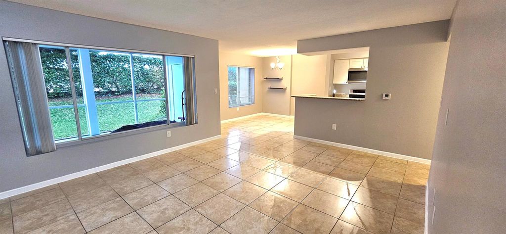 Photo of 815 W Boynton Beach Boulevard #7-105, Boynton Beach, FL 33426 (MLS # R10965114)