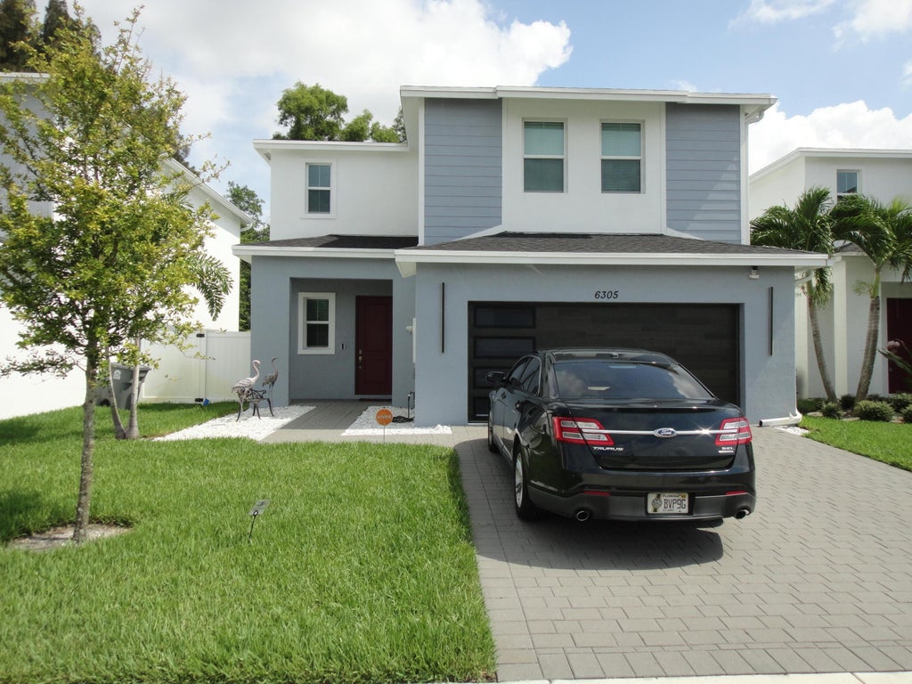 Photo of 6305 Tenor Drive, West Palm Beach, FL 33413 (MLS # B26057552)