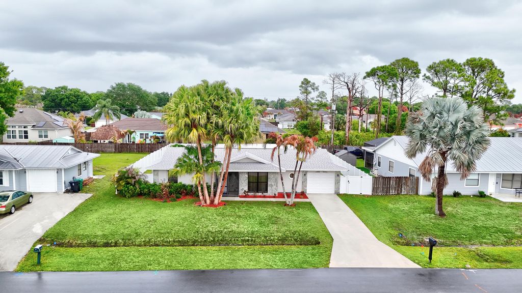 Photo of 1711 SW Aztec Avenue S, Port Saint Lucie, FL 34953 (MLS # B26010976)