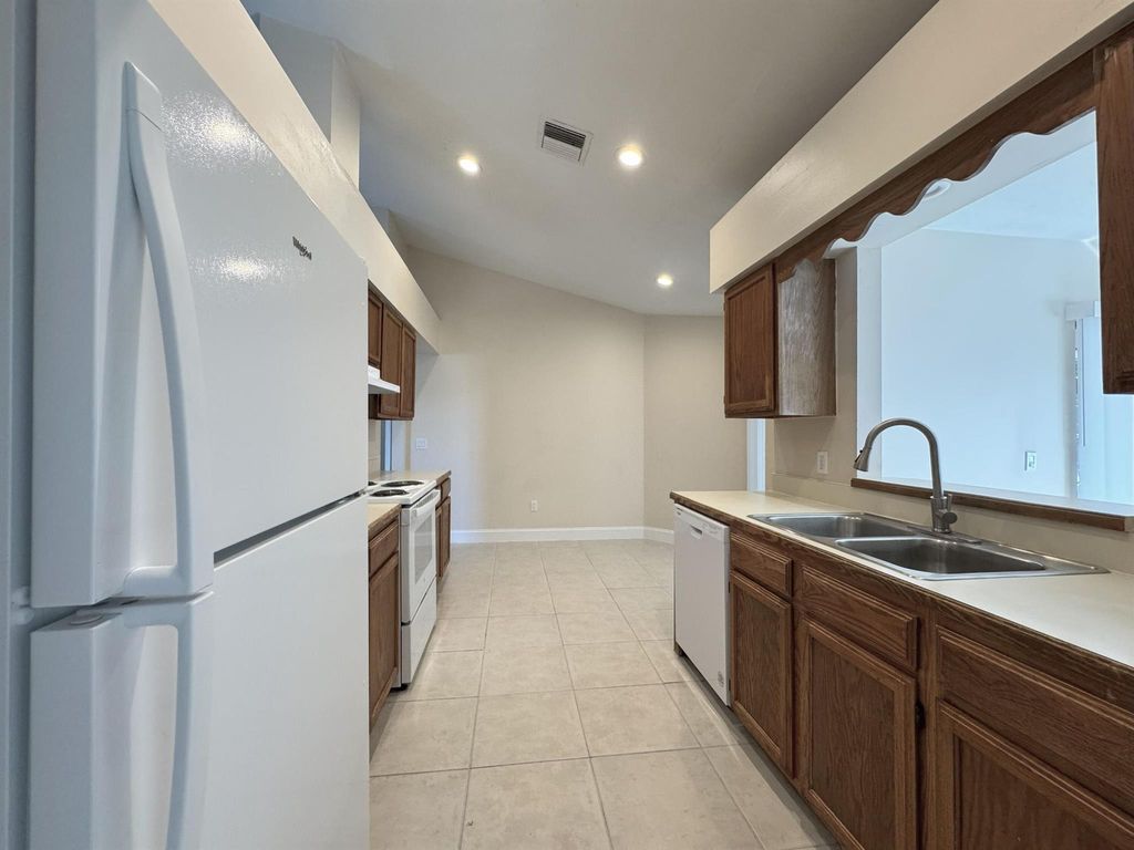 Photo of 330 SE Inwood Avenue, Port Saint Lucie, FL 34984 (MLS # R11047070)