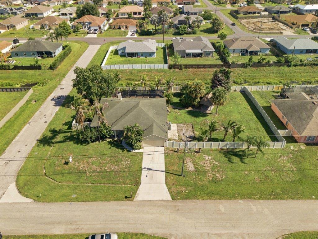 Photo of 499 SW MILLARD Drive, Port Saint Lucie, FL 34953 (MLS # B26067572)