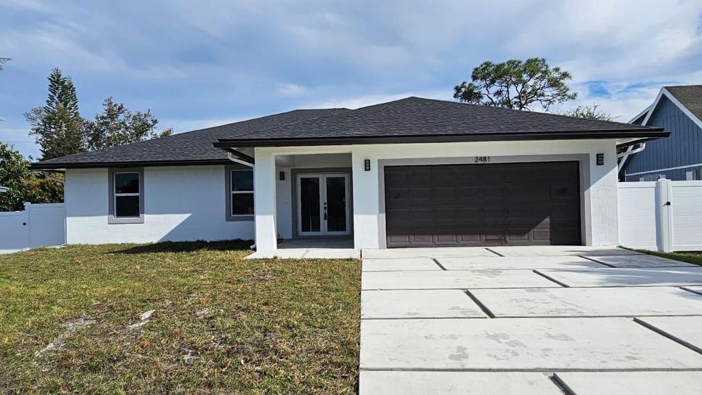 Photo of 2481 SE Stonecrop Street, Port Saint Lucie, FL 34984 (MLS # R10959640)