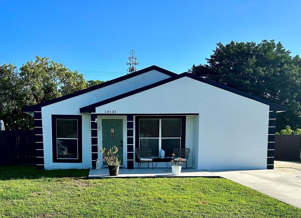 Photo of 10131 Mikado Lane, Royal Palm Beach, FL 33411 (MLS # R10894993)