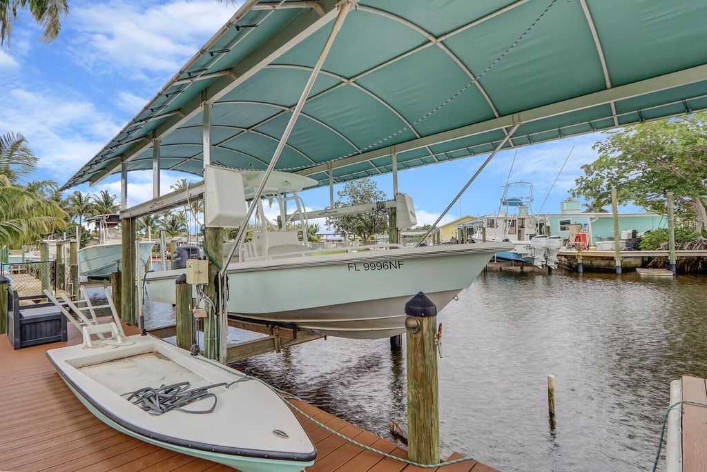 Photo of 1392 SW Seahawk Way, Palm City, FL 34990 (MLS # R10977232)