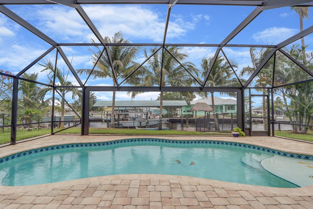 Photo of 1392 SW Seahawk Way, Palm City, FL 34990 (MLS # R10977232)