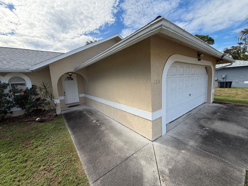 Photo of 120 SW Bedford Road, Port Saint Lucie, FL 34953 (MLS # F10548065)
