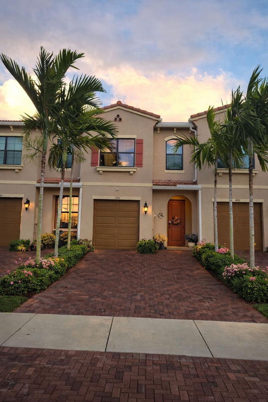 Step into this stunning lakefront two-story townhome located in the highly sought-after Enclave at Boca Dunes. Built in 2020 and gently enjoyed as a seasonal residence, this home offers the feel of brand-new construction and is truly move-in ready. Thoughtfully designed, the home features 3 spacious bedrooms upstairs, 2.5 bathrooms, and a 1-car garage complemented by a full 2-car driveway. The interior showcases upgraded flooring throughout, creating a seamless and modern flow, along with impact glass for peace of mind. The kitchen is both stylish and functional, complete with quartz countertops, upgraded cabinetry, and an open layout ideal for entertaining. Natural light pours into the living spaces, highlighting the tranquil lake views that can also be enjoyed from the primary suite. Step outside to a generous patio where you can relax and take in the serene waterfront setting year-round—perfect for morning coffee or evening sunsets. Residents of Enclave at Boca Dunes enjoy access to resort-style amenities including a clubhouse, pool and spa, fitness center, playground, and scenic walking paths. Ideally located near the best of Boca Raton, you're just minutes from top-tier dining, shopping, and beautiful beaches.