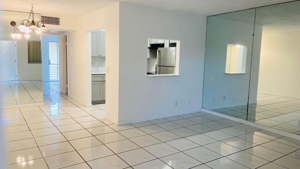 Photo of 600 Village Green Court #304, Palm Springs, FL 33461 (MLS # B26014100)