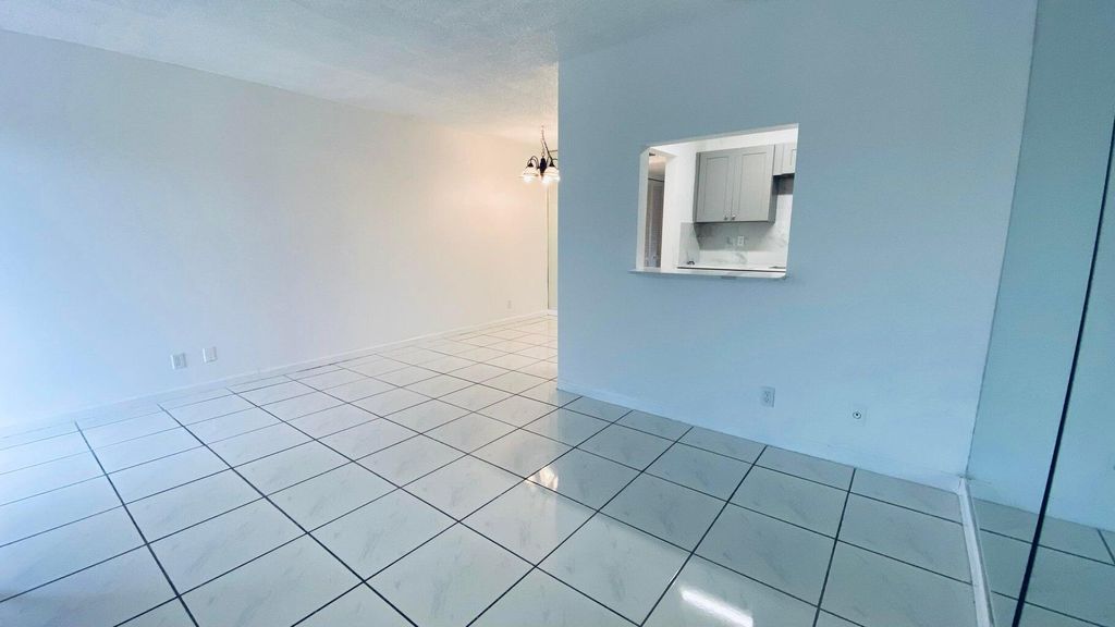 Photo of 600 Village Green Court #304, Palm Springs, FL 33461 (MLS # B26014100)