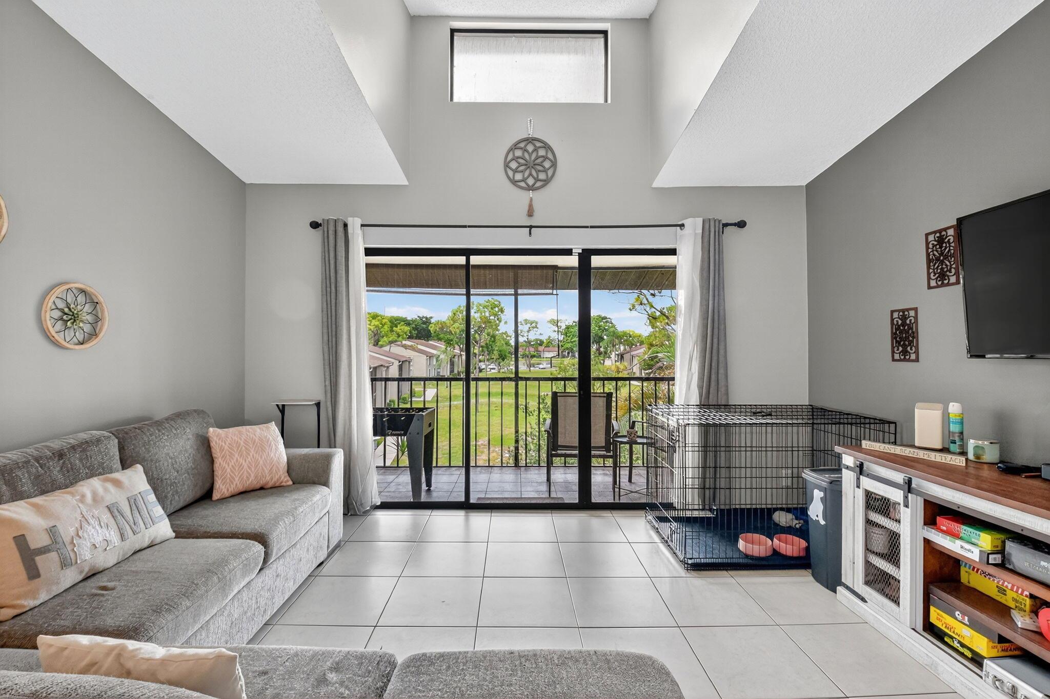 This beautifully updated 3rd-floor 2 bed 2 bath unit offers comfort, style, and convenience all in one. Located in Pine Ridge North Village lll of Greenacres! LOW HOA! This unit features a fully, just remodeled shower with brand-new plumbing throughout. The updated kitchen boasts new, sleek appliances. Other highlights include vaulted ceilings, built-in shelving in the primary closet, newer water heater (Nov. 2022), a new washer and dryer, and accordion hurricane shutters on all windows. Unwind on your private, screened-in balcony--graced with tranquil garden views and the added serenity of being a top-floor residence with no one above you.The community is very well-kept and offers fantastic amenities including a pool, tennis courts, and a clubhouse.
