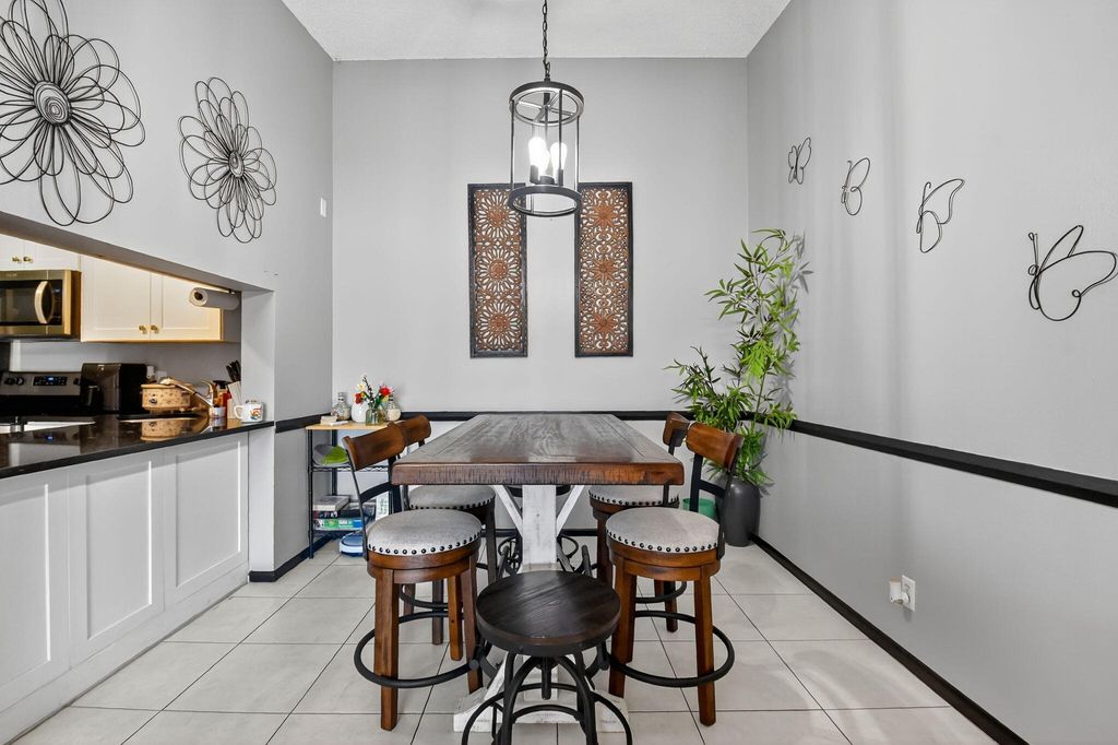 Photo of 719 Sunny Pine Way #C3, Greenacres, FL 33415 (MLS # R11115186)