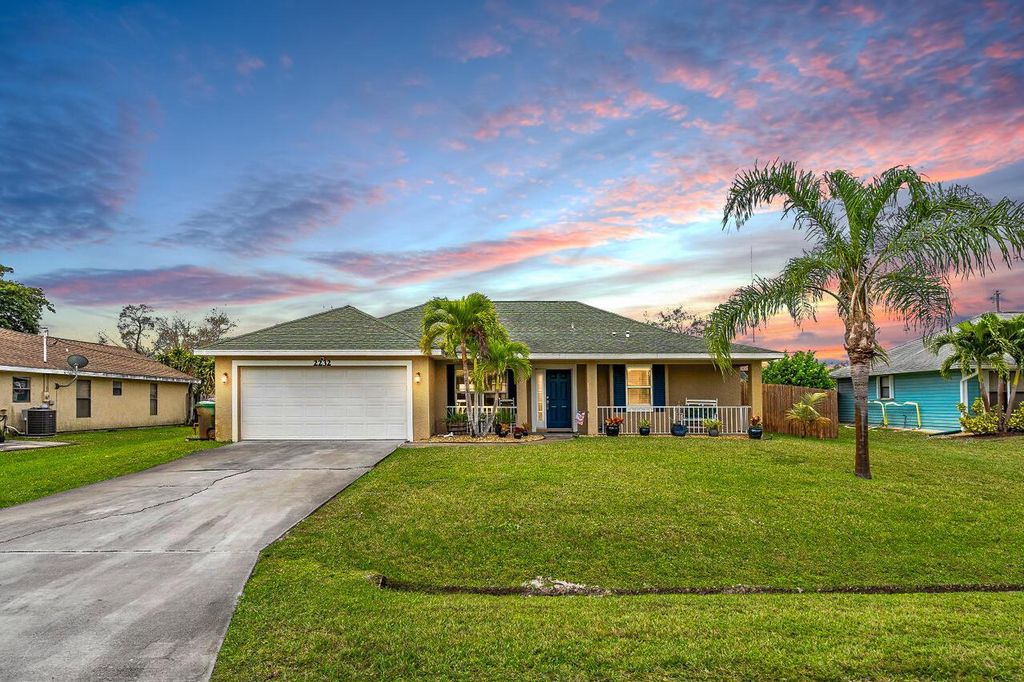 Photo of 2232 SE Mcmaster Street, Port Saint Lucie, FL 34952 (MLS # R10965357)