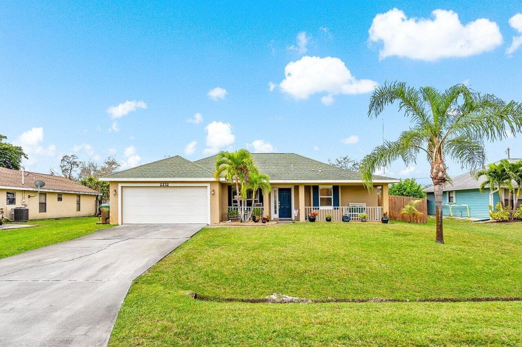 Photo of 2232 SE Mcmaster Street, Port Saint Lucie, FL 34952 (MLS # R10965357)