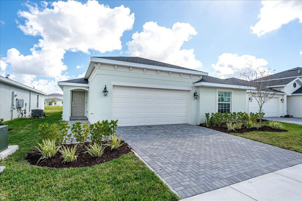 Photo of 6331 NW Windwood Way, Port Saint Lucie, FL 34987 (MLS # R11161733)