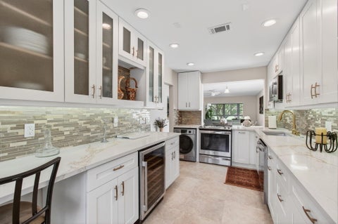 Photo of 30 Southport Lane #H, Boynton Beach, FL 33436 (MLS # B26053420)