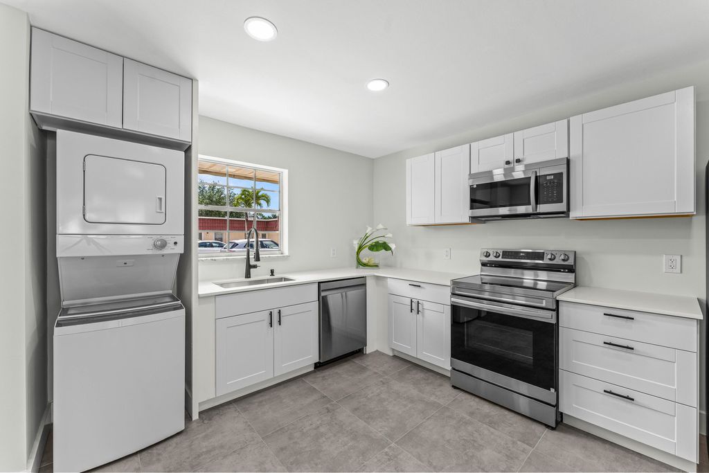 Photo of 711 Laconia Circle #B, Greenacres, FL 33467 (MLS # B26022459)