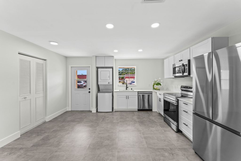 Photo of 711 Laconia Circle #B, Greenacres, FL 33467 (MLS # B26022459)