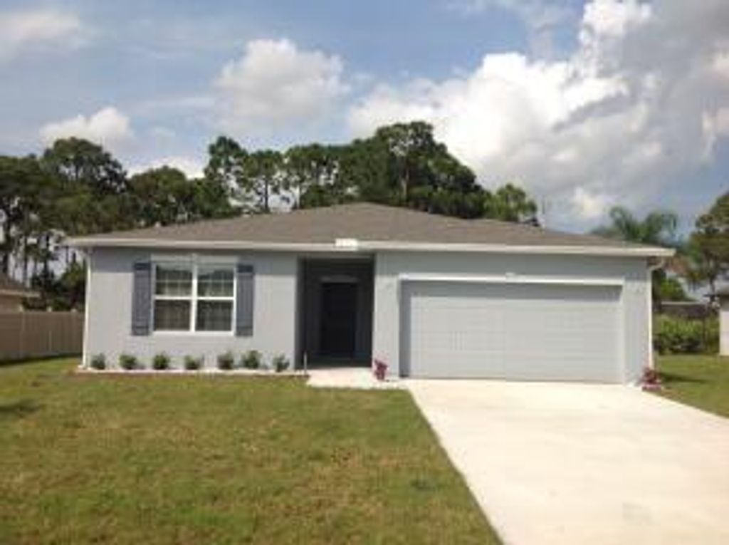 Photo of 1213 SW Emerald Avenue, Port Saint Lucie, FL 34953 (MLS # R10781383)