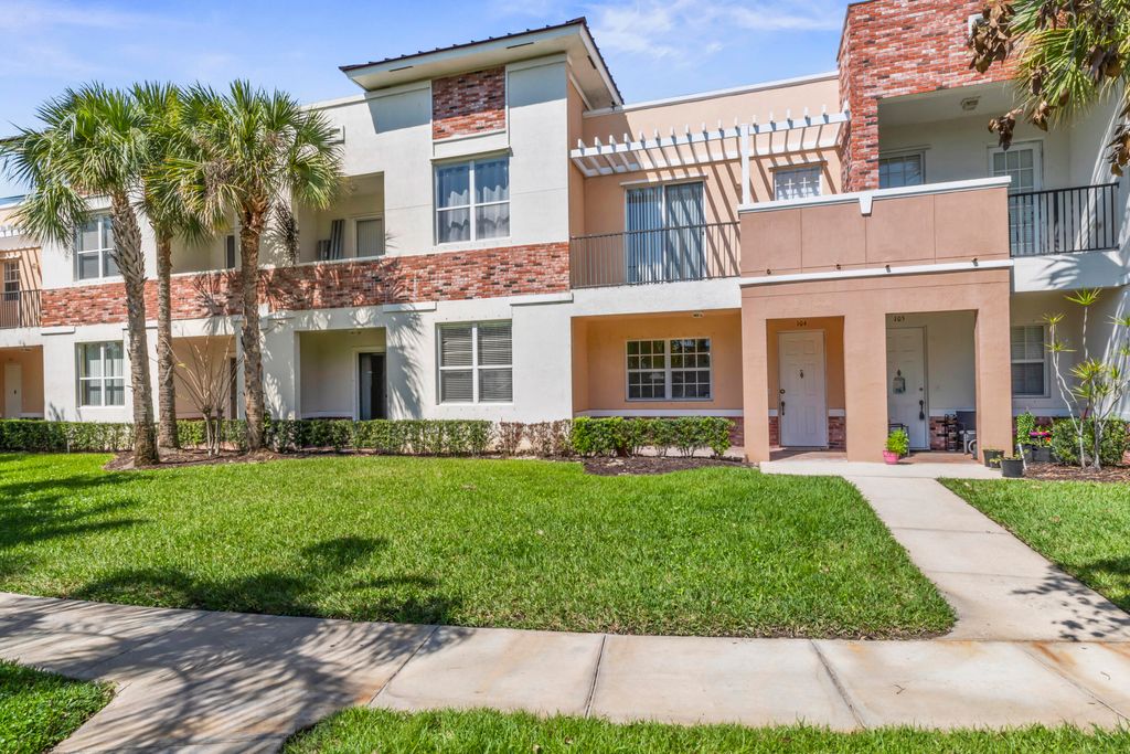Photo of 10520 SW Stephanie Way #2-104, Port Saint Lucie, FL 34987 (MLS # B26007749)
