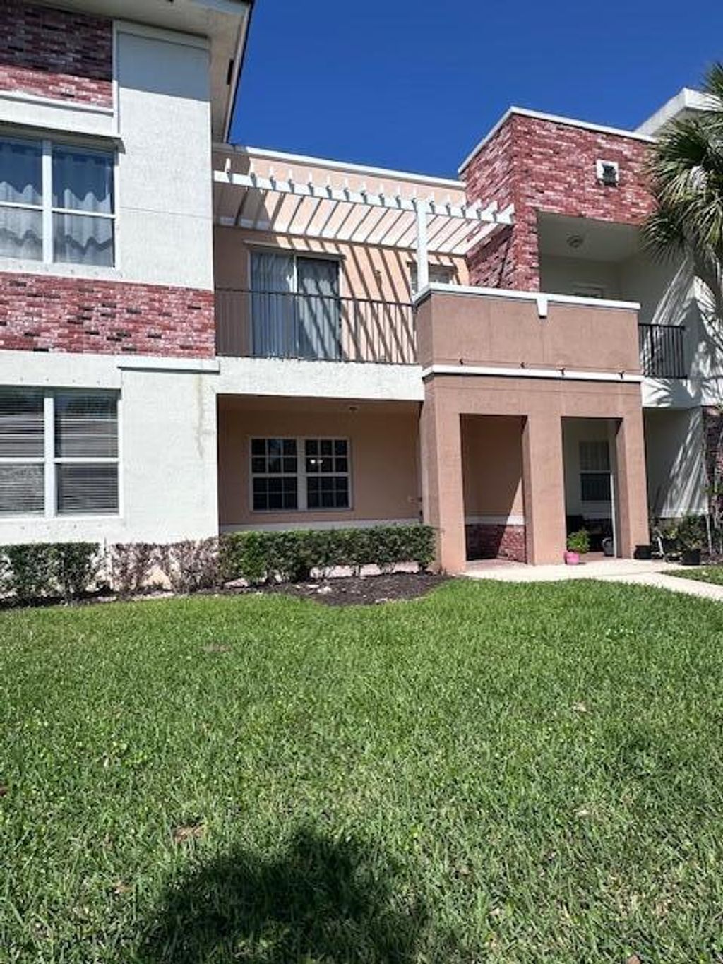 Photo of 10520 SW Stephanie Way #2-104, Port Saint Lucie, FL 34987 (MLS # B26007749)