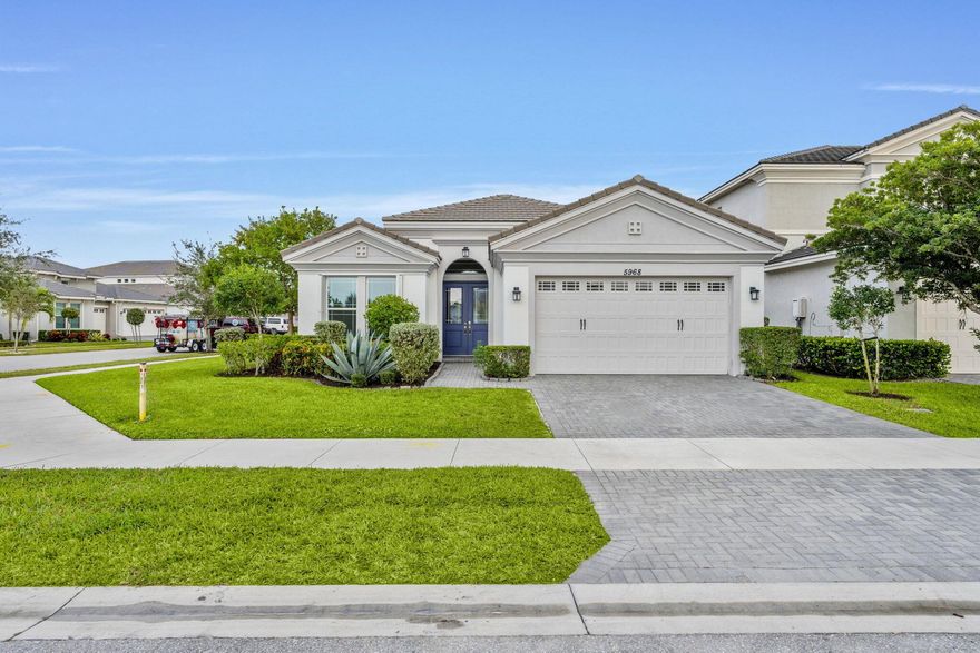 Beautifully Upgraded Persimmon Model on a Corner Lot! This spacious 3-bedroom, 2.5-bathroom home with a 2-car garage offers a large open split floor plan, perfect for modern living. Enjoy gorgeous wood-look tile flooring throughout the main living areas and an upgraded kitchen designed to impress with sleek finishes and contemporary style. The stunning primary suite features a luxurious bathroom with a large walk-in shower and designer touches. Located within one of the top-rated school districts in Palm Beach County, this home also gives you access to Westlake's brand-new amenities center--complete with a resort-style aquatic complex, event spaces, basketball courts, dog park, adventure playground, outdoor concert pavilion, and much more!