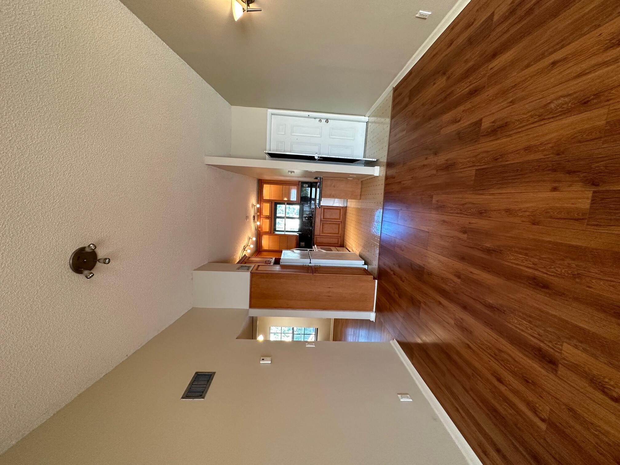 Beautiful second floor unit with lake view and high ceiling. No carpet. You must see!