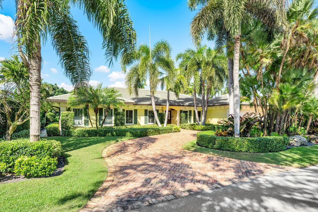 Photo of 1851 Thatch Palm Drive, Boca Raton, FL 33432 (MLS # R11148113)
