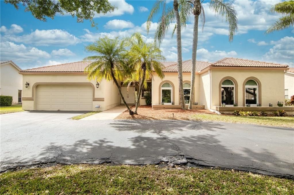 Photo of 5466 NW 85th Ave, Coral Springs, FL 33067 (MLS # F10276853)