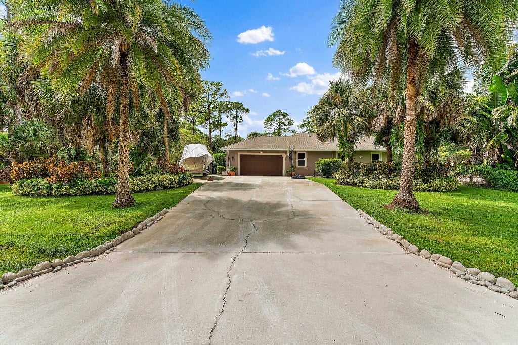 Photo of 9511 150th Court N, Jupiter, FL 33478 (MLS # R10923660)