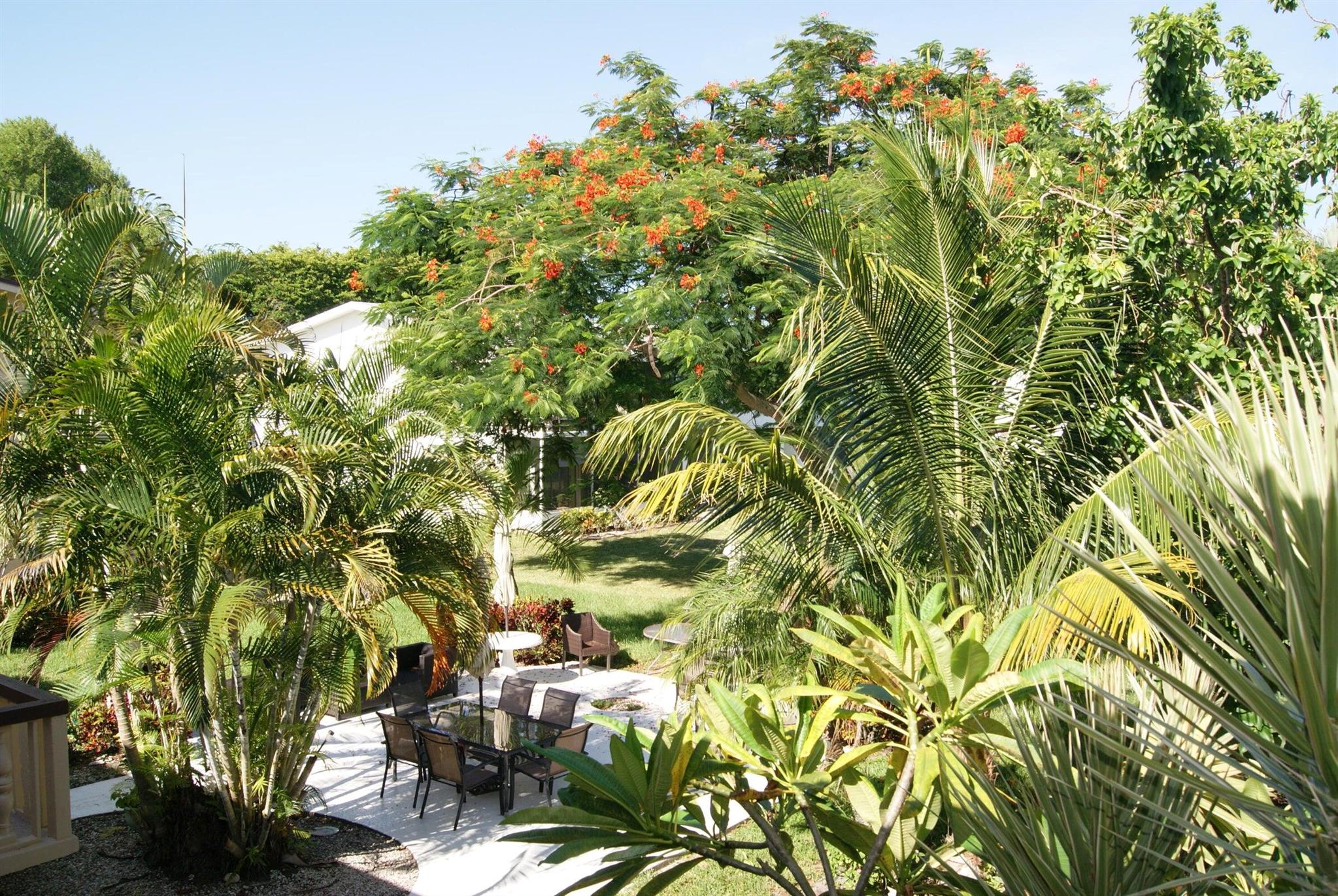 An impeccably maintained condo, perfectly situated near the clubhouse and pools, with tranquil garden vistas. Rarely available with central air, enhancing both comfort and convenience.