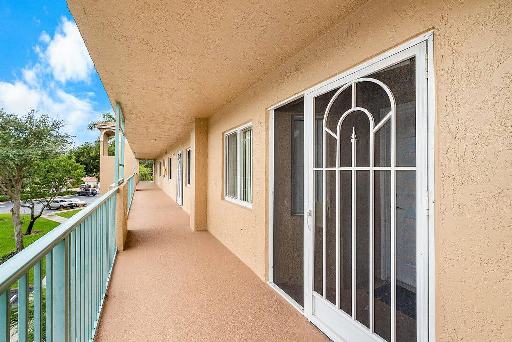 Photo of 12560 Majesty Circle #303, Boynton Beach, FL 33437 (MLS # R11126401)