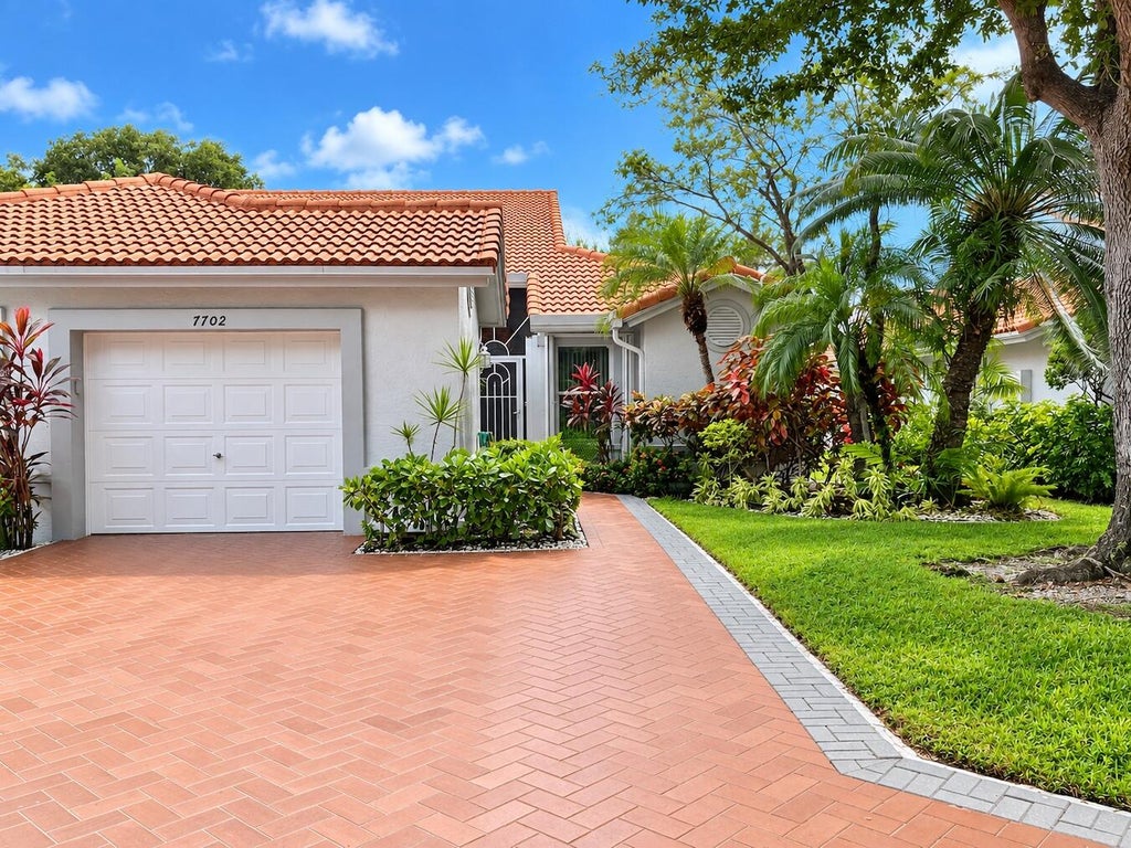 Photo of 7702 MAJESTIC PALM Drive, Boynton Beach, FL 33437 (MLS # B26077448)