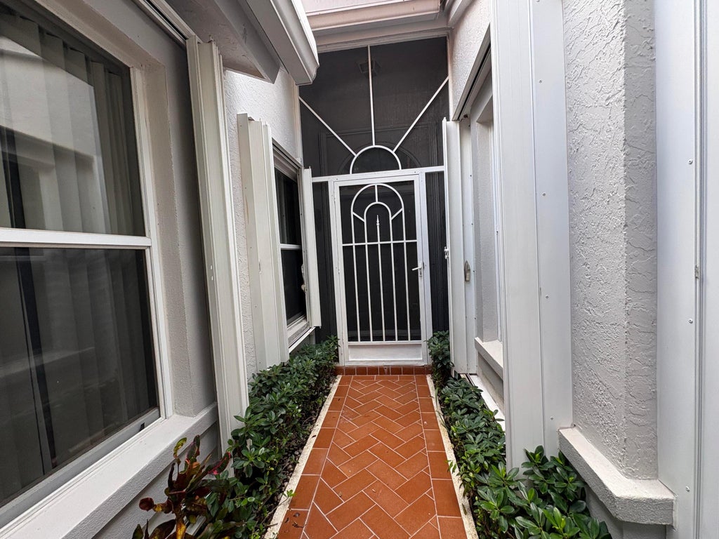 Photo of 7702 MAJESTIC PALM Drive, Boynton Beach, FL 33437 (MLS # B26077448)