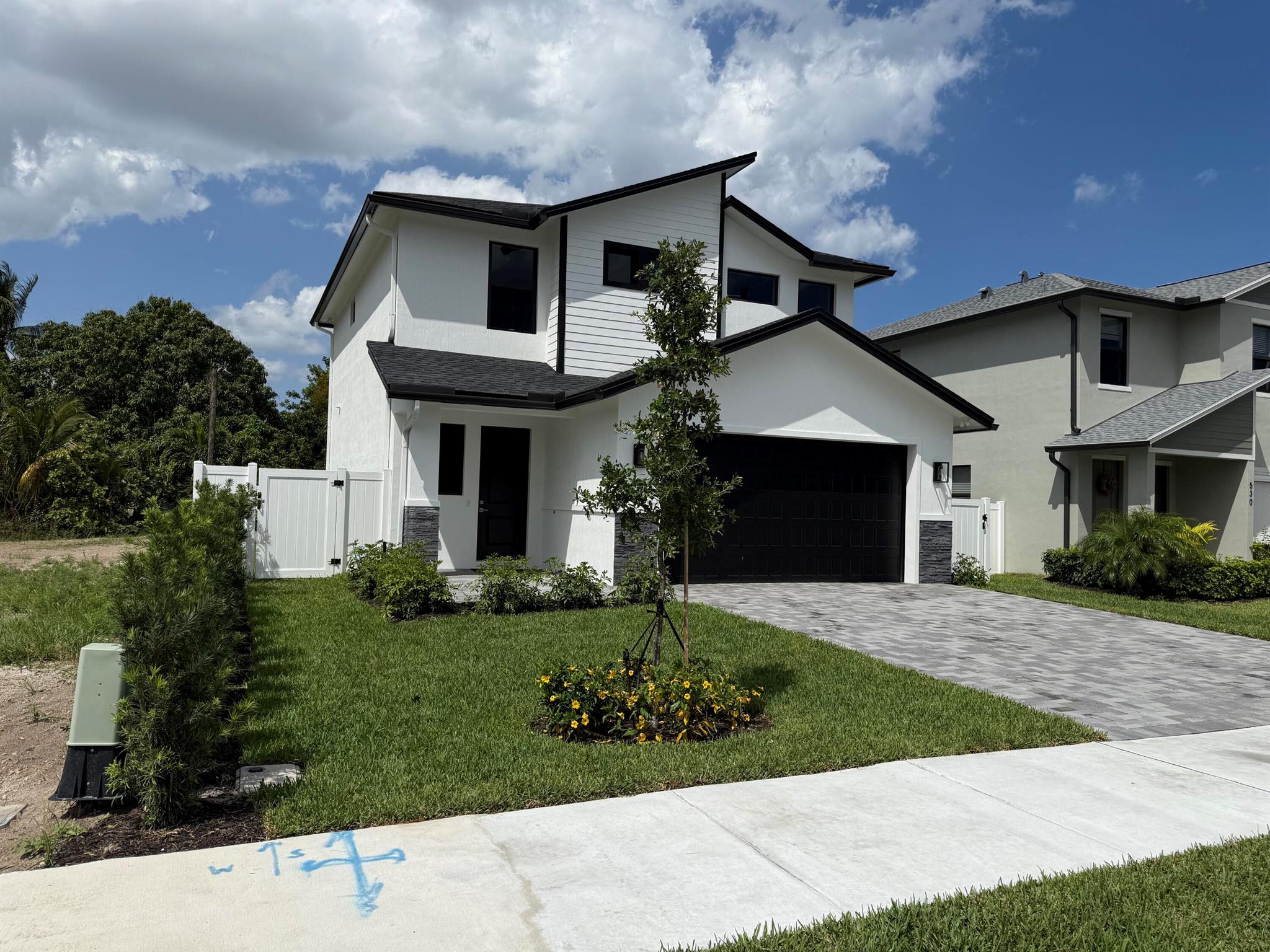 Insurance chaos got you down? Then this SUPERIOR BUILT ALL CONCRETE BLOCK BRAND NEW CONSTRUCTION is what you need. HOI is only $2,342 with a 2% wind! WOW! 24x48 porcelain tile, bar height island w/ waterfall quartz, premium appliances, decorative stone accents, high impact glass, 8' solid core doors, tall ceilings & custom stair railing. Bedrooms, loft & laundry room are upstairs. The primary suite is large w/ a coffer ceiling, custom fitted WIC, dual sinks, MU vanity & large shower. Relax in the fenced yard w/ pool w/ deck jets, sun shelf & covered patio. Quiet cul-de-sac street w/ sidewalks, streetlights & a city park. Walk, bike or golfcart just 1/2 mile to Starbucks & Whole Foods or only 1.3 miles to coveted Atlantic Ave or just 1 mile to the beach, this home checks all the boxes.