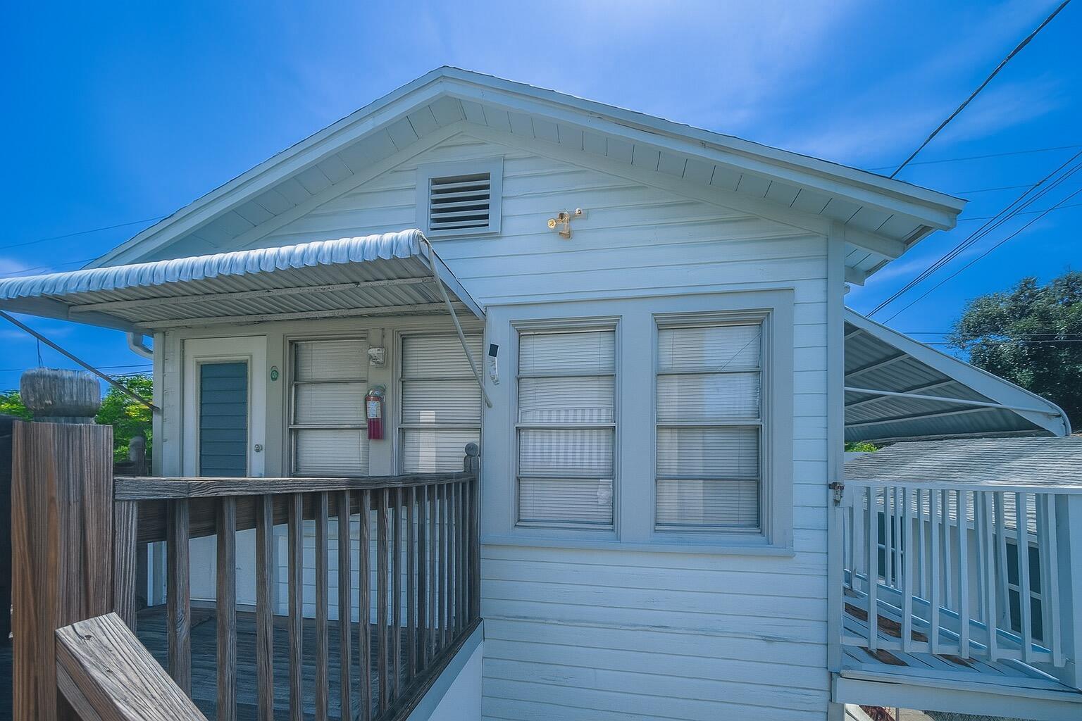 .Studio unit with private deck, 2nd floor unit, recently renovated with beautiful new flooring throughout. Excellent location near downtown Lake Worth Beach, just 5 minutes from the beach, with no HOA. Water is included, offering extra savings. Enjoy an easy and fast move-in process. Perfect for those seeking a comfortable, low-maintenance lifestyle close to vibrant shops, restaurants, and all that the area has to offer.