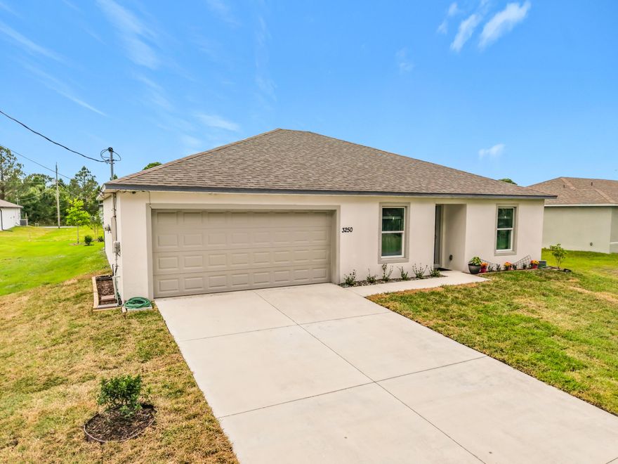 Move-in ready newer construction built in 2022 with a functional open layout. The kitchen opens to the great room, creating a versatile space for entertaining, working from home, or relaxing. The oversized garage, currently a workshop, can serve as a gym, man cave, or playroom. Enjoy your backyard with a pergola-style shaded structure, bamboo wall, and space for a fire pit, perfect for relaxing or hosting. Features include R30 attic insulation, 3M window film on all windows for heat and UV protection, and a water filtration system with reverse osmosis. Aggressively priced for today's market, an excellent opportunity without the wait of new construction