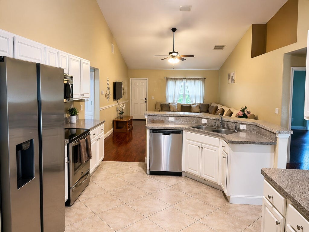 Photo of 2256 SW FRANKLIN Street, Port Saint Lucie, FL 34953 (MLS # B26080965)