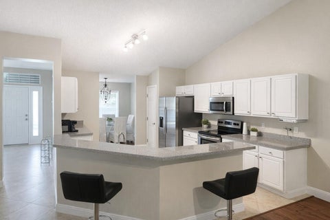 Photo of 2256 SW FRANKLIN Street, Port Saint Lucie, FL 34953 (MLS # B26080965)