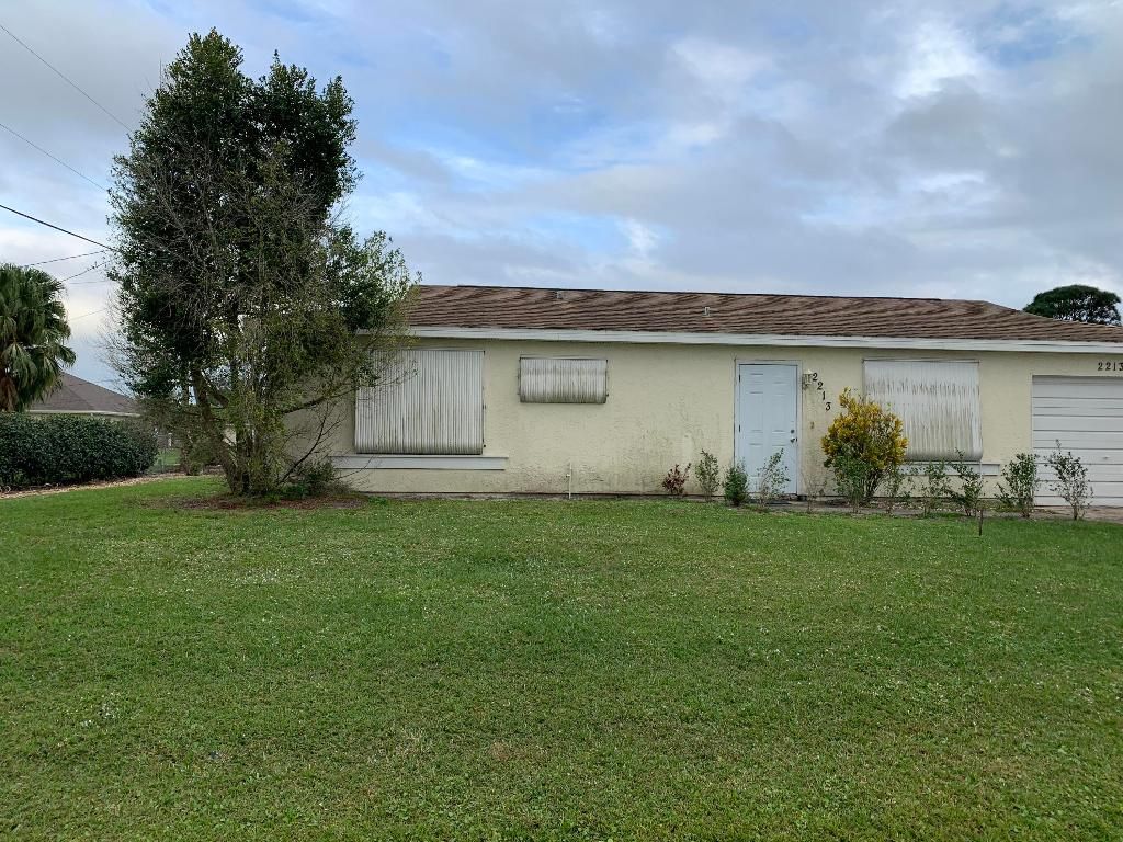 Photo of 2213 SE Pear Lane, Port Saint Lucie, FL 34952 (MLS # R10959561)