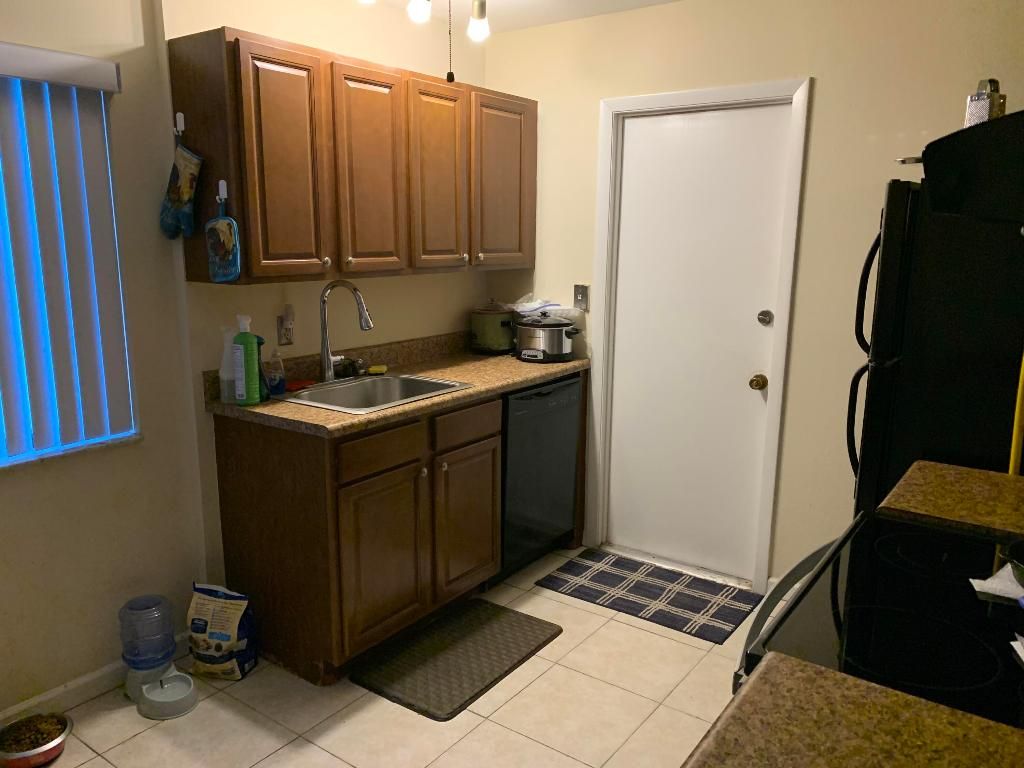 Photo of 2213 SE Pear Lane, Port Saint Lucie, FL 34952 (MLS # R10959561)